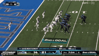 A Football Game Between The Seahawks And The Ravens GIF