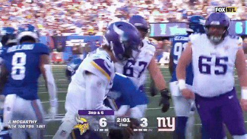 A Football Game Between The Vikings And The Giants Is Being Shown On Fox Nfl GIF