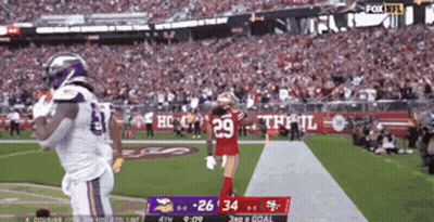 A Football Game Between The Vikings And The San Francisco 49Ers GIF