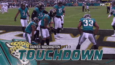 A Football Game Between The Washington Jaguars And The New York Jets GIF