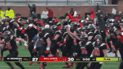 A Football Game Between W Michigan And Ball State GIF