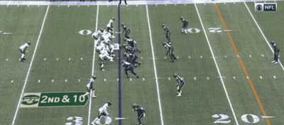 A Football Game Is Being Played And The Number 50 Is On The Back Of A Jersey GIF