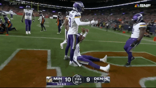 A Football Game Is Being Played Between Minnesota And Den GIF