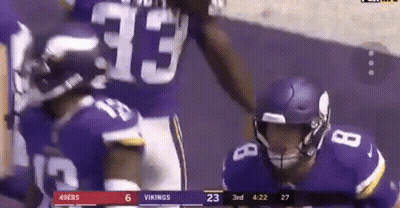 A Football Game Is Being Played Between The 49Ers And Vikings GIF