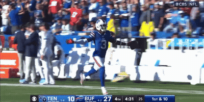 A Football Game Is Being Played Between The Buffalo Bills And The Titans GIF