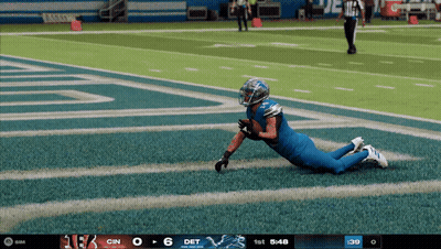 A Football Game Is Being Played Between The Detroit Lions And The Cincinnati Bengals GIF