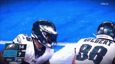 A Football Game Is Being Played Between The Eagles And The Jets GIF
