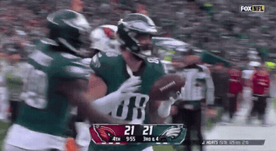 A Football Game Is Being Played Between The Eagles And The Redskins GIF