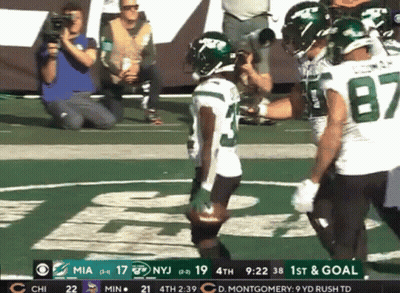A Football Game Is Being Played Between The Jets And The Chicago Bears GIF