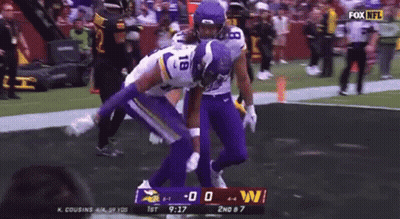 A Football Game Is Being Played Between The Minnesota Vikings And The Washington Redskins . GIF