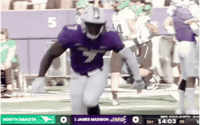 A Football Game Is Being Played Between The North Dakota And The Miami Dolphins GIF