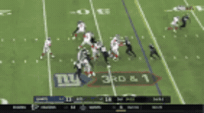 A Football Game Is Being Played Between The Ny Giants And The Washington Redskins GIF