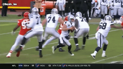 A Football Game Is Being Played Between The Raiders And The Kansas City Chiefs GIF