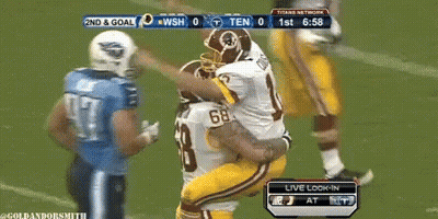 A Football Game Is Being Played Between The Redskins And The Titans GIF