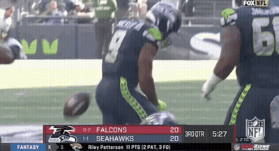 A Football Game Is Being Played Between The Seahawks And The Falcons On Fox NFL . GIF