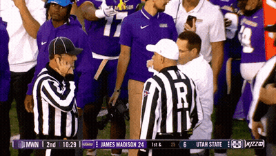 A Football Game Is Being Played Between The Utah State And James Madison GIF