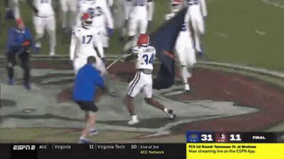 A Football Game Is Being Played Between Virginia Tech And Tennessee St. At Montana GIF