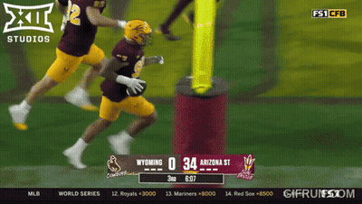 A Football Game Is Being Played Between Wyoming And Arizona St GIF