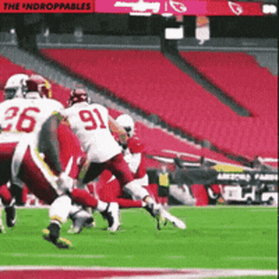 A Football Game Is Being Played In An Empty Stadium GIF