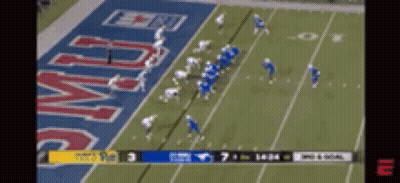 A Football Game Is Being Played In Front Of A Banner That Says ' Army ' GIF