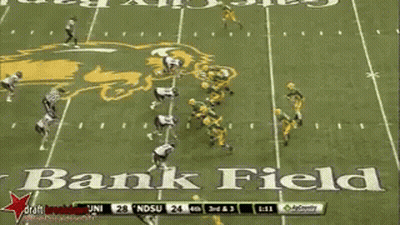 A Football Game Is Being Played In Front Of A Gate City Bank Logo GIF