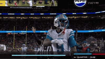 A Football Game Is Being Played In Front Of A Pepsi Ad GIF