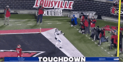 A Football Game Is Being Played In Louisville And The Score Is Touchdown GIF