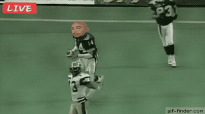 A Football Game Is Being Played Live And The Referee Has The Number 53 On His Back GIF