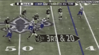 A Football Game Is Being Played On A Field With A Gif Section.com Logo In The Background GIF