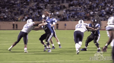 A Football Game Is Being Played On A Field With Duke Ebs Video Written On The Bottom GIF