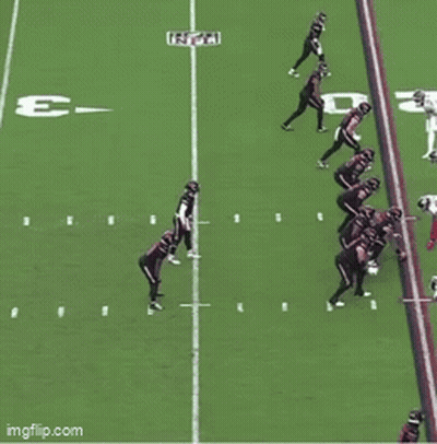 A Football Game Is Being Played On A Field With The Letter E In The Middle GIF