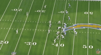 A Football Game Is Being Played On A Field With The Number 30 On It GIF