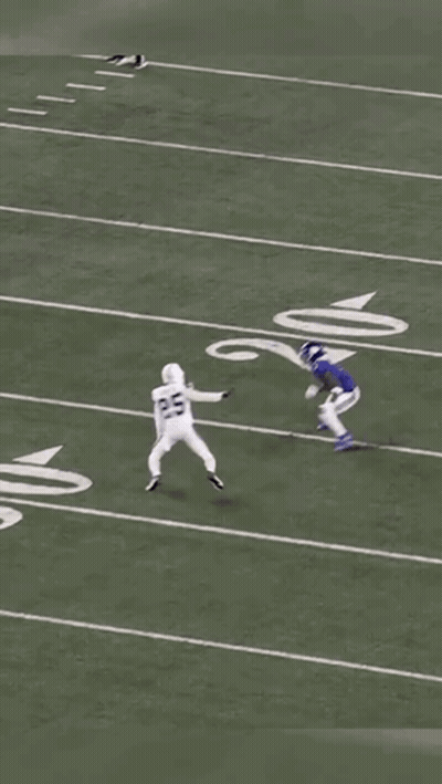 A Football Game Is Being Played On A Field With The Number 6 On The Sideline GIF