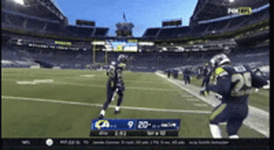 A Football Game Is Being Played On Fox GIF