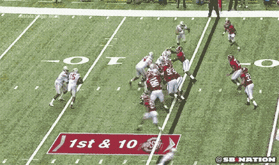 A Football Game Is Being Shown On Espn With A Crowd Watching GIF
