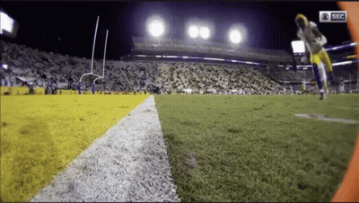 A Football Game Is Being Shown On Sec Television GIF