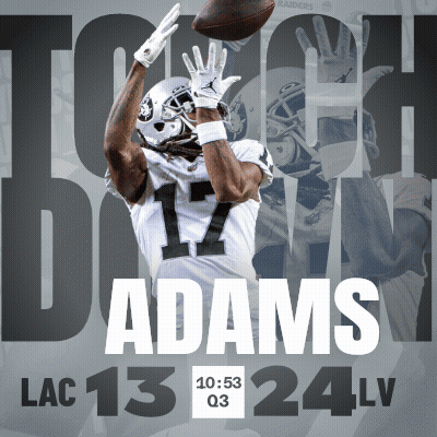 A Football Player Catching A Ball With The Name Adams On The Bottom GIF