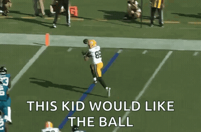 A Football Player Catching A Ball With The Words This Kid Would Like The Ball GIF