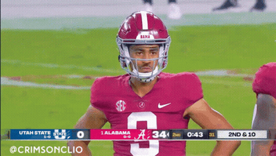 A Football Player For Alabama Stands On The Field GIF