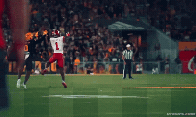 A Football Player In A Black Jersey With The Number 0 On It GIF