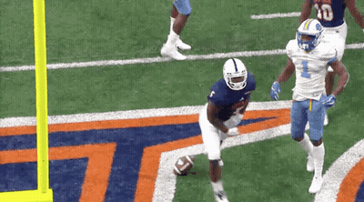 A Football Player In A Blue Jersey With The Number 10 On His Jersey GIF