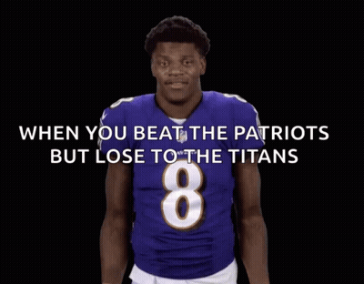 A Football Player In A Purple Jersey With The Number 8 GIF