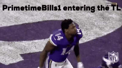 A Football Player In A Purple Uniform Is Jumping In The Air . GIF