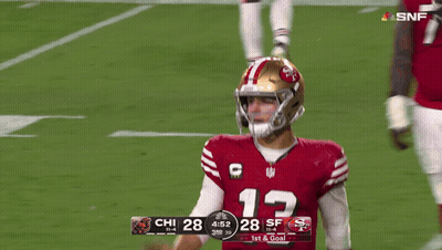A Football Player In A Red Jersey With The Number 13 On It GIF