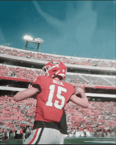 A Football Player In A Red Jersey With The Number 15 On It GIF