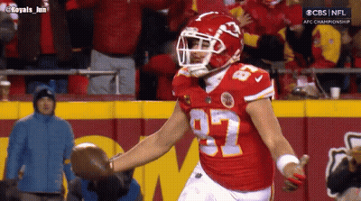 A Football Player In A Red Uniform With The Number 92 On It GIF