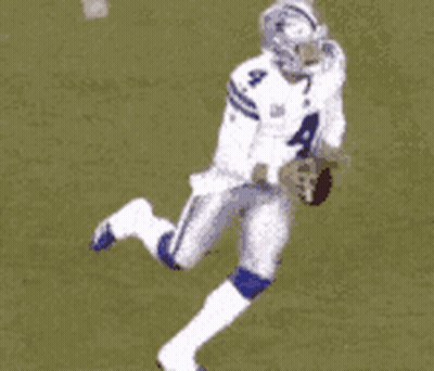 A Football Player In A White Uniform With The Number 4 On It GIF