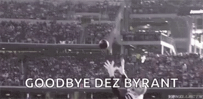 A Football Player Is Catching A Ball In A Stadium With The Words `` Goodbye Dez Bryant '' . GIF
