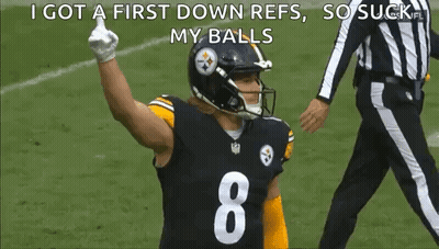A Football Player Is Giving A Thumbs Up While Wearing A Helmet And Number 8 Jersey . GIF