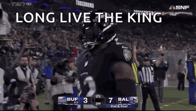 A Football Player Is Standing On A Field With The Words `` Long Live The King '' On The Screen . GIF